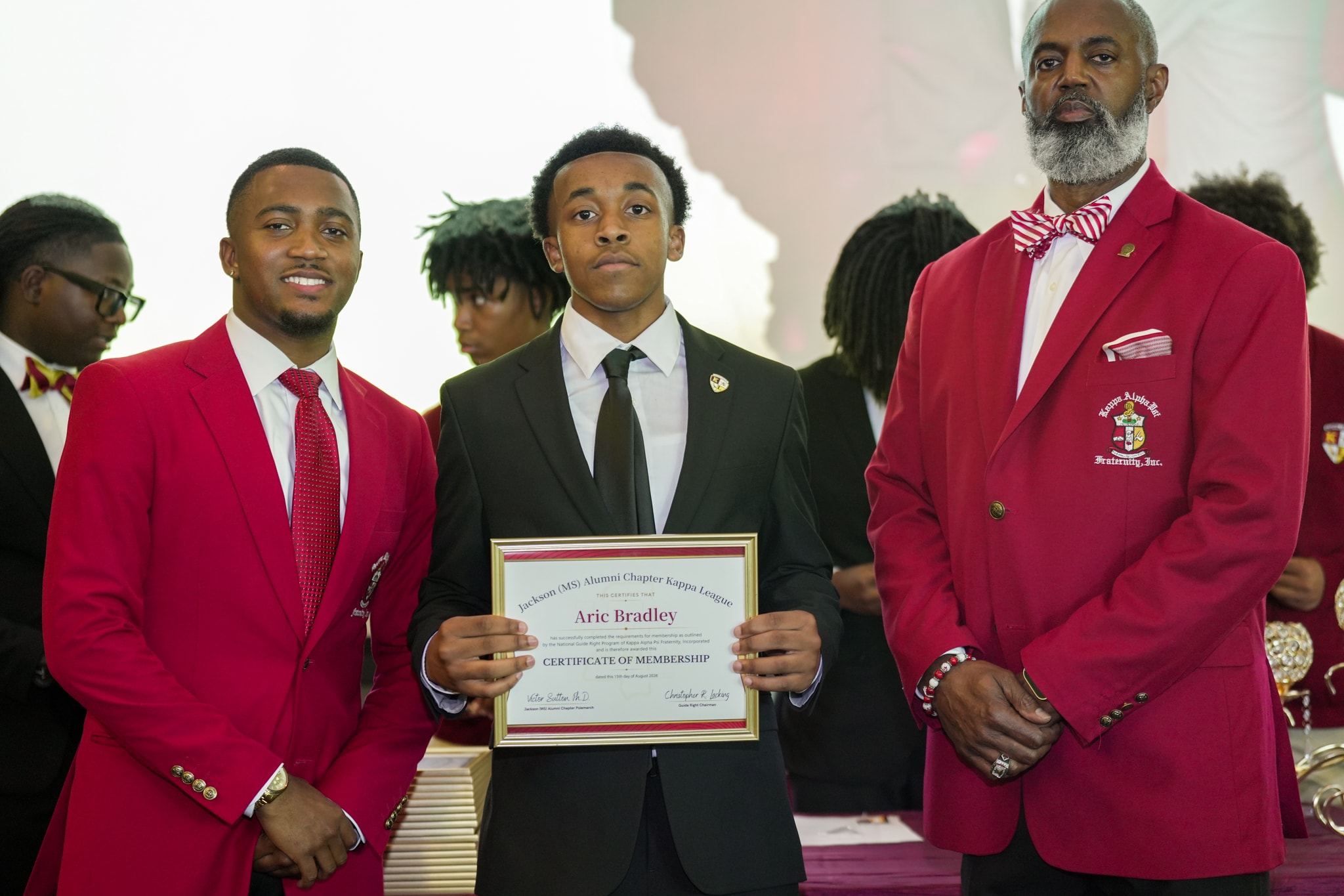 Kappa League member receiving certificate of membership